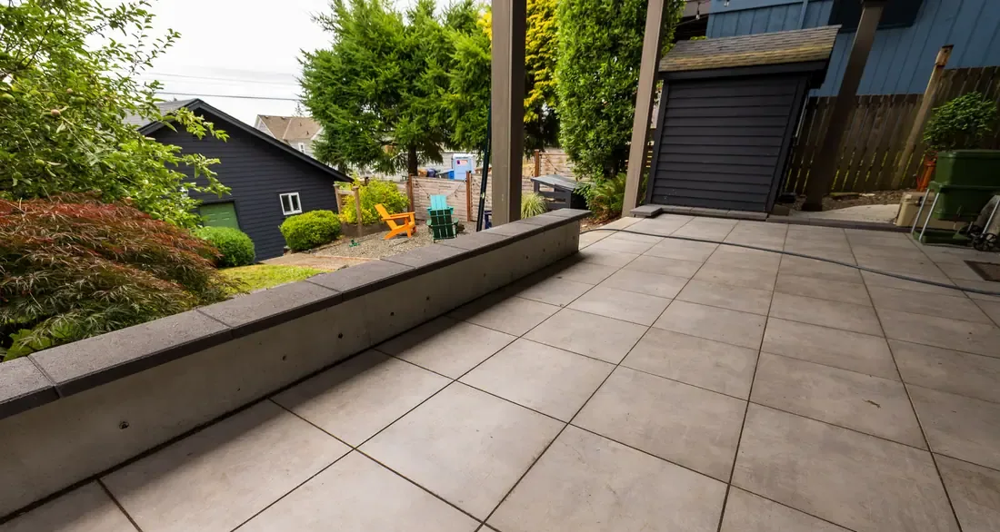 Paver patio with a fire pit and seating